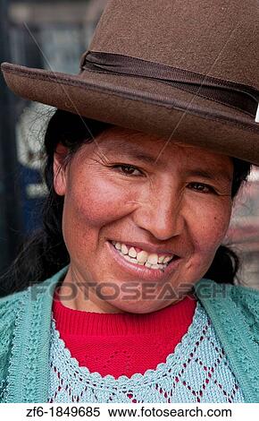 Traditional woman in dress and hat in small town of Pisaq Peru View Large Photo Image Stock Photography - Traditional woman in dress and hat in small town of Pisaq Peru. Fotosearch