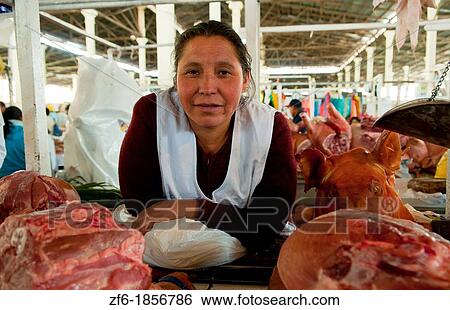 Traditional woman selling bread meat in market in Cusco Cuzco Peru View Large Photo Image Stock Photograph - Traditional woman selling bread meat in market in Cusco Cuzco Peru. Fotosearch
