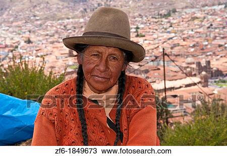 Traditional woman with colorful clothes selling souvenirs in religious region Saqsayhuaman tourist attration near Cusco Peru View Large Photo Image Stock Image - Traditional woman with colorful clothes selling souvenirs in religious region Saqsayhuaman tourist attration near Cusco Peru. Fotosearch