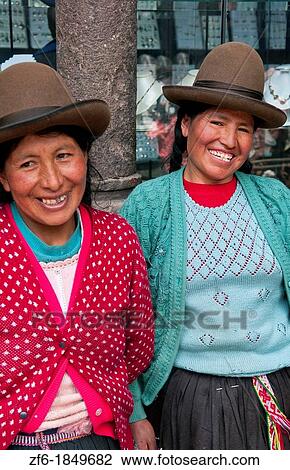 Traditional women in dress and hat in small town of Pisaq Peru View Large Photo Image Stock Image - Traditional women in dress and hat in small town of Pisaq Peru. Fotosearch