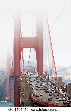 Traffic and fog on the Golden Gate Bridge, San Francisco, California, USA View Large Photo Image Stock Image - Traffic and fog on the Golden Gate Bridge, San Francisco, California, USA. Fotosearch