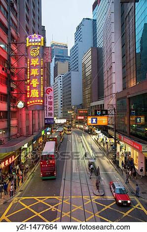 traffic and pedestrians in downtown Hong Kong, China View Large Photo Image Picture - traffic and pedestrians in downtown Hong Kong, China. Fotosearch