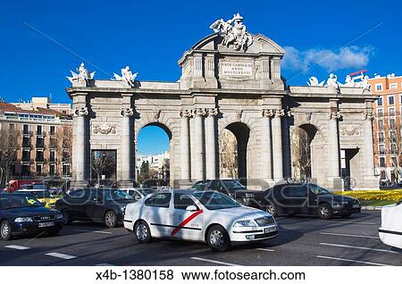Traffic at Plaza de la Independencia square roundabout central Madrid Spain Europe View Large Photo Image Stock Photo - Traffic at Plaza de la Independencia square roundabout central Madrid Spain Europe. Fotosearch