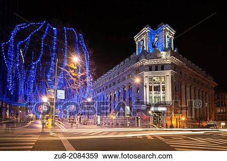 Traffic at the intersection of Gran Via de Bilbao, with Christmas decorations. View Large Photo Image Stock Photo - Traffic at the intersection of Gran Via de Bilbao, with Christmas decorations.. Fotosearch