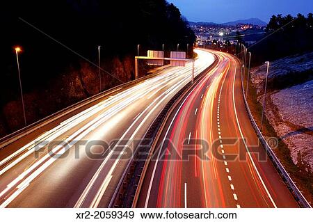 Traffic in the highway at night, Donostia - San Sebastian, Basque Country, Spain View Large Photo Image Stock Photo - Traffic in the highway at night, Donostia - San Sebastian, Basque Country, Spain. Fotosearch