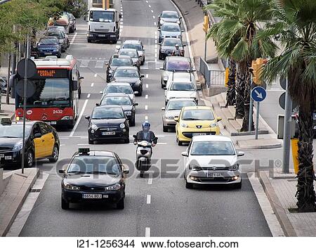 Traffic jam. Cars, bus and motorcycles in Travessera de Dalt. Gr? cia quarter, Barcelona, Catalonia, Spain. View Large Photo Image Picture - Traffic jam. Cars, bus and motorcycles in Travessera de Dalt. Gr? cia quarter, Barcelona, Catalonia, Spain.. Fotosearch