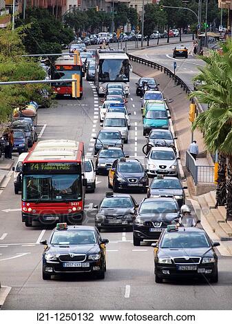 Traffic jam. Cars, bus and motorcycles in Travessera de Dalt. Gr? cia quarter, Barcelona, Catalonia, Spain. View Large Photo Image Stock Image - Traffic jam. Cars, bus and motorcycles in Travessera de Dalt. Gr? cia quarter, Barcelona, Catalonia, Spain.. Fotosearch