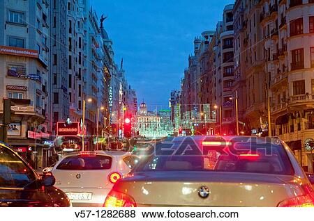 Traffic jam in Gran V? a Street at Christmas time, night view. Madrid, Spain. View Large Photo Image Stock Photo - Traffic jam in Gran V? a Street at Christmas time, night view. Madrid, Spain.. Fotosearch