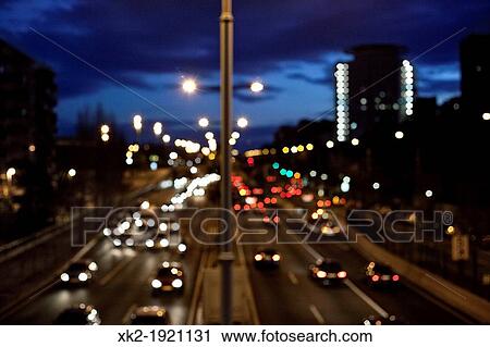 Stock Image - Traffic jam in rush hour at dusk, Barcelona. Fotosearch
