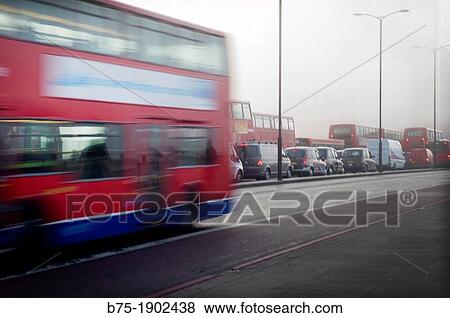 Stock Photo - traffic on London Bridge, London, England, UK, double decker bus. Fotosearch