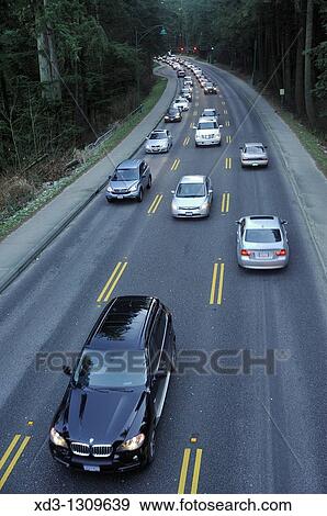 Traffic on Stanley Park Causeway, Vancouver, British Columbia, Canada. View Large Photo Image Stock Photo - Traffic on Stanley Park Causeway, Vancouver, British Columbia, Canada.. Fotosearch