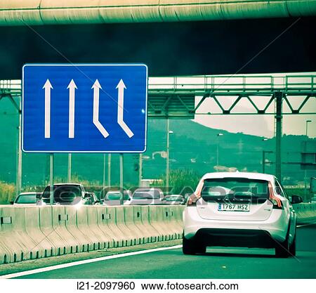 Traffic sign and car. Barcelona, Catalonia, Spain. View Large Photo Image Stock Image - Traffic sign and car. Barcelona, Catalonia, Spain.. Fotosearch