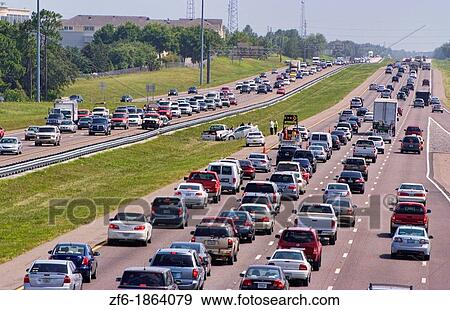Traffic tied up due to accident on Interstate Highway system in Florida on I-4 with backup crowded View Large Photo Image Stock Photo - Traffic tied up due to accident on Interstate Highway system in Florida on I-4 with backup crowded. Fotosearch