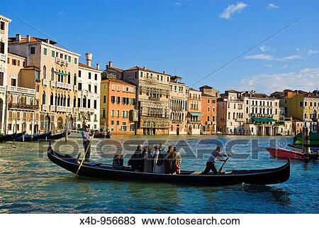 Traghetti boat crossing Grande Canal at Santa Sofia traghetto stop in Venice Italy Europe View Large Photo Image Stock Image - Traghetti boat crossing Grande Canal at Santa Sofia traghetto stop in Venice Italy Europe. Fotosearch