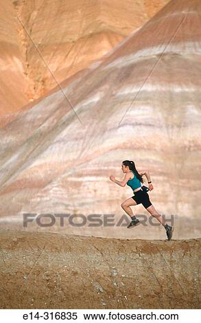 Stock Photography - Trail running.? The movie set?. Grand Staircase-Escalante National Monument. Utah. USA. Fotosearch
