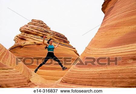 Stock Photo - Trail running.? The Wave?. Coyote Buttes. Grand Staircase-Escalante National Monument. Utah. USA. Fotosearch