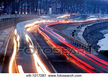 Trails of light from traffic travelling under the chain bridge in Budapest, Hungary View Large Photo Image Stock Photo - Trails of light from traffic travelling under the chain bridge in Budapest, Hungary. Fotosearch