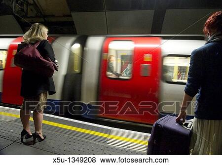 TRain arriving at the platform London Bridge station, UK London Underground Tube filmed under film permit issued by Kate Reston London Underground Film Office October 2010 View Large Photo Image Stock Photo - TRain arriving at the platform London Bridge station, UK London Underground Tube filmed under film permit issued by Kate Reston London Underground Film Office October 2010. Fotosearch