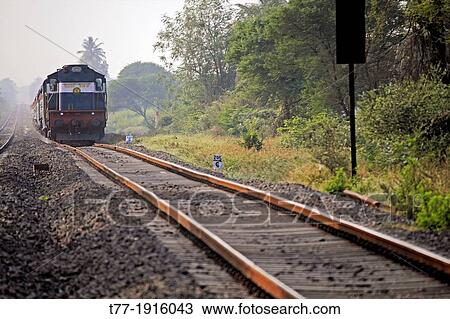 Train on Railroad track, Pune, Maharashtra, India View Large Photo Image Stock Image - Train on Railroad track, Pune, Maharashtra, India. Fotosearch