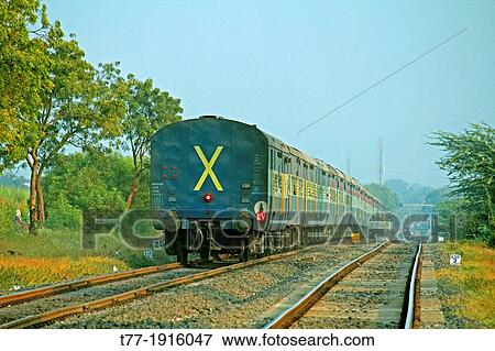 Train on Railroad track, Pune, Maharashtra, India View Large Photo Image Stock Photo - Train on Railroad track, Pune, Maharashtra, India. Fotosearch