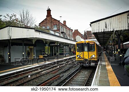 Picture - Train Station in Surrey, Liverpool, UK. Fotosearch