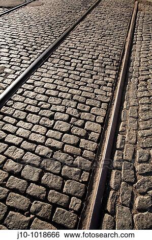 Stock Photograph - Train tracks with paving stones, Fan Pier, South Boston, Massachusetts, USA. Fotosearch