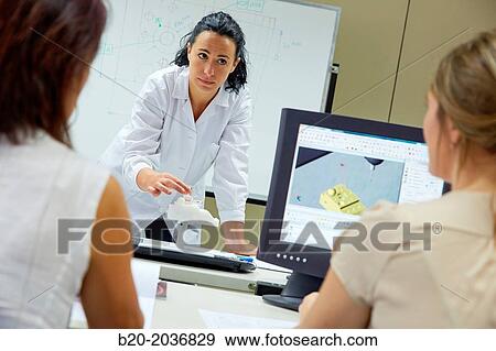 Stock Photo - Training room. Professor giving a course in dimensional measurement software. Innovative Metrology applied. Sariki Metrology. Elgoibar. Gipuzkoa. Basque Country. Spain.. Fotosearch