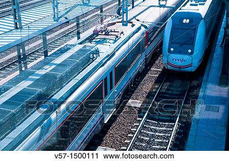 Stock Image - Trains at railway station. View from above.. Fotosearch