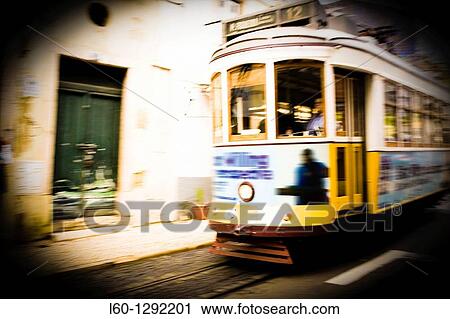 Tram in Alfama, Lisboa, Portugal View Large Photo Image Stock Image - Tram in Alfama, Lisboa, Portugal. Fotosearch
