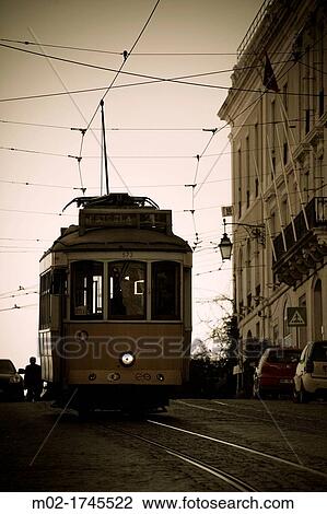 Tram in Lisbon downtown, Portugal, Europe View Large Photo Image Stock Image - Tram in Lisbon downtown, Portugal, Europe. Fotosearch
