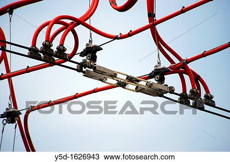 tram power cables, Geneva, Switzerland, against blue sky View Large Photo Image Stock Image - tram power cables, Geneva, Switzerland, against blue sky. Fotosearch