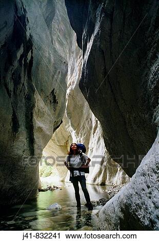 Tramper exploring Sawcut Gorge near Kaikoura New Zealand View Large Photo Image Stock Image - Tramper exploring Sawcut Gorge near Kaikoura New Zealand. Fotosearch