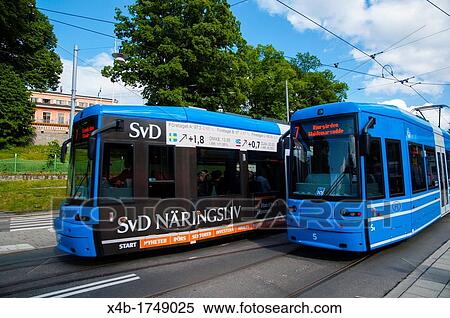 Stock Photography - Trams on Djurg? rdsv? gen street Djurg? rden district Stockholm Sweden Europe. Fotosearch