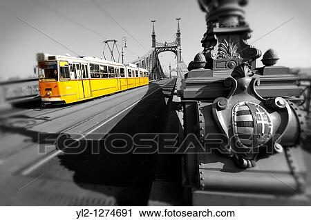 Trams on the Liberty or Freedom Bridge SzabadsBg h? d, Budapest, Hungary View Large Photo Image Stock Image - Trams on the Liberty or Freedom Bridge SzabadsBg h? d, Budapest, Hungary. Fotosearch