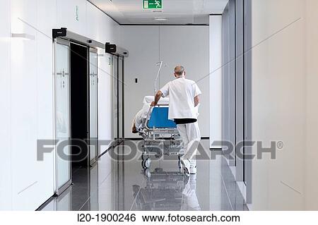 Stock Photograph - transferring patient, Onkologikoa Hospital, Oncology Institute, Case Center for prevention, diagnosis and treatment of cancer, Donostia, San Sebastian, Gipuzkoa, Basque Country, Spain. Fotosearch