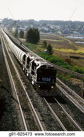 Transportation, loaded coal train. Energy, fossil fuel, greenhouse gases, global warming. View Large Photo Image Stock Image - Transportation, loaded coal train. Energy, fossil fuel, greenhouse gases, global warming.. Fotosearch