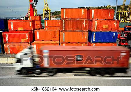 Transportation of containers in the port of Barcelona, Barcelona, Catalonia, Spain. View Large Photo Image Picture - Transportation of containers in the port of Barcelona, Barcelona, Catalonia, Spain.. Fotosearch