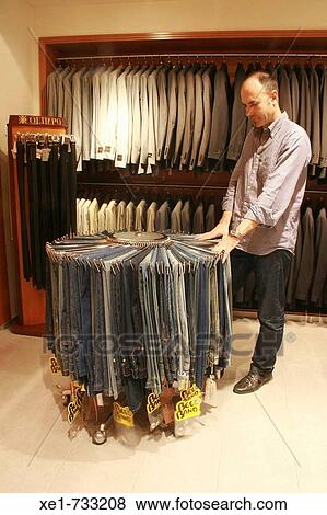 Traousers & Jakets. Jordi Messeguer Boutique? s. Barcelona. Catalonia. Spain. View Large Photo Image Stock Photo - Traousers & Jakets. Jordi Messeguer Boutique? s. Barcelona. Catalonia. Spain.. Fotosearch
