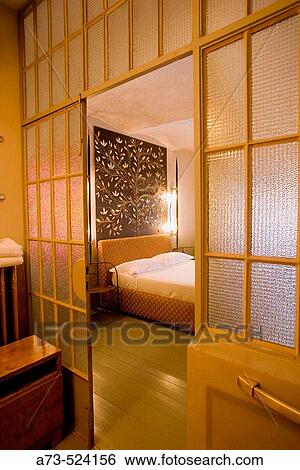 Stock Photograph - Trattoria, Dispensa, Locanda (restaurant, hotel, food shop)? Da Amerigo?. The Bedroom n. 3. Savigno, Bologna province, Italy.. Fotosearch