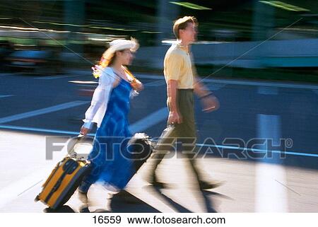 Traveling couple View Large Photo Image Stock Photo - Traveling couple. Fotosearch