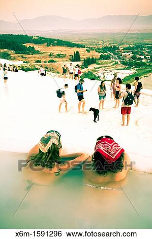 Travertine terrace formations and tourists Pamukkale Denizli province Anatolia Turkey View Large Photo Image Stock Photograph - Travertine terrace formations and tourists Pamukkale Denizli province Anatolia Turkey. Fotosearch