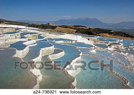 Stock Image - Travertines terraces, Pamukkale, Turkey. Fotosearch