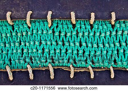 trawl nets details left on fishing harbour quay Saint Vaast la Hougue Manche 50 france View Large Photo Image Stock Photograph - trawl nets details left on fishing harbour quay Saint Vaast la Hougue Manche 50 france. Fotosearch