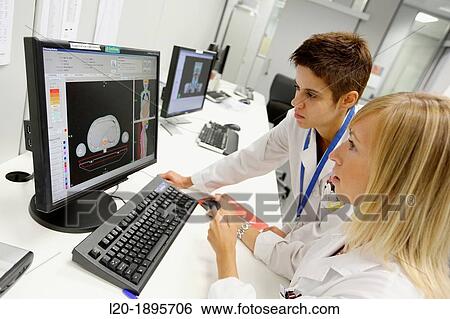 Stock Photograph - Treatment craniospinal and ORL with IMRT Intensity Modulated Radiation Therapy, Medical physics, radiation treatment application, imaging, Onkologikoa Hospital, Oncology Institute. Fotosearch