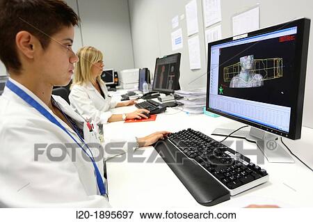 Stock Photo - Treatment ORL with IMRT Intensity Modulated Radiation Therapy, Medical physics, radiation treatment application, imaging, Onkologikoa Hospital, Oncology Institute. Fotosearch