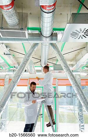 Treatment system air conditioning, Kubik, Experimental laboratory R & D for the development of new concepts, products and services to improve energy efficiency in buildings, Intelligent management of HVAC and lighting systems and renewable energy supply View Large Photo Image Stock Image - Treatment system air conditioning, Kubik, Experimental laboratory R & D for the development of new concepts, products and services to improve energy efficiency in buildings, Intelligent management of HVAC and lighting systems and renewable energy supply. Fotosearch