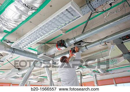 Stock Photo - Treatment system air conditioning, Kubik, Experimental laboratory R & D for the development of new concepts, products and services to improve energy efficiency in buildings, Intelligent management of HVAC and lighting systems and renewable energy supply. Fotosearch