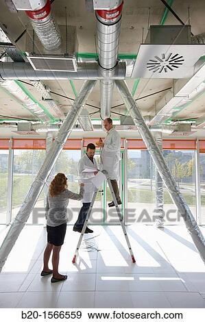 Stock Photo - Treatment system air conditioning, Kubik, Experimental laboratory R & D for the development of new concepts, products and services to improve energy efficiency in buildings, Intelligent management of HVAC and lighting systems and renewable energy supply. Fotosearch