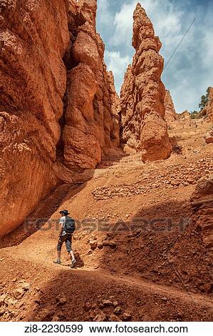 Stock Photo - Trecking the rocky landscape, Bryce Canyon, Utah, USA.. Fotosearch
