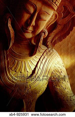 Stock Image - Tredotiona wooden sculpture, Mandalay, Burma. Fotosearch